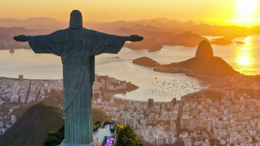 Statue of Christ overlooking Rio de Janeiro at sunset